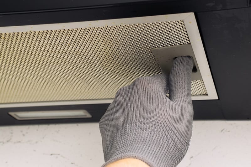 Removing cooker hood grease filter