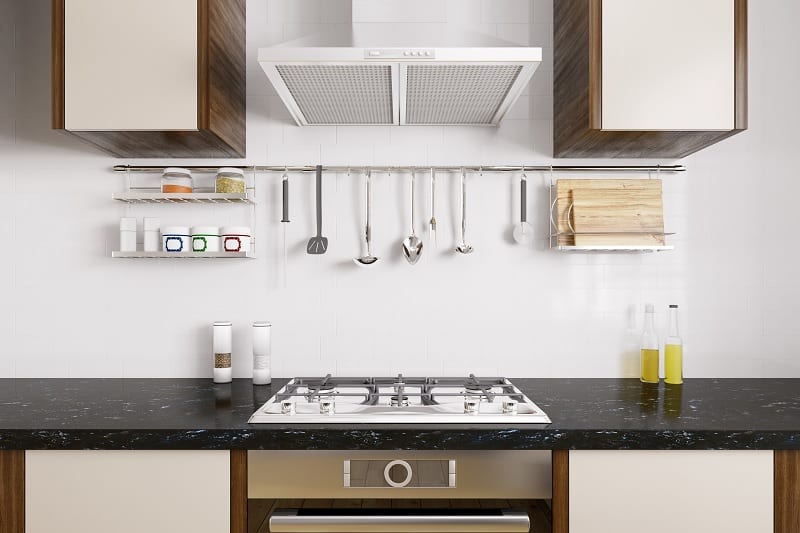 Kitchen countertop with hob and cooker hood