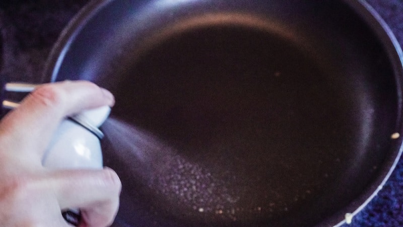 Spraying Cooking Spray On Frying Pan