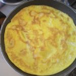 Making an omelette in a pan