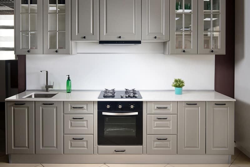 Cooker with gas hob in kitchen