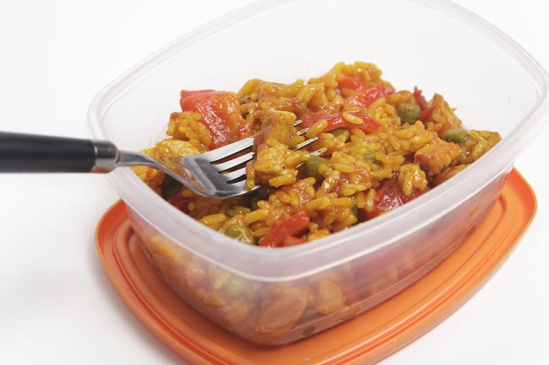 Paella in Tupperware tub