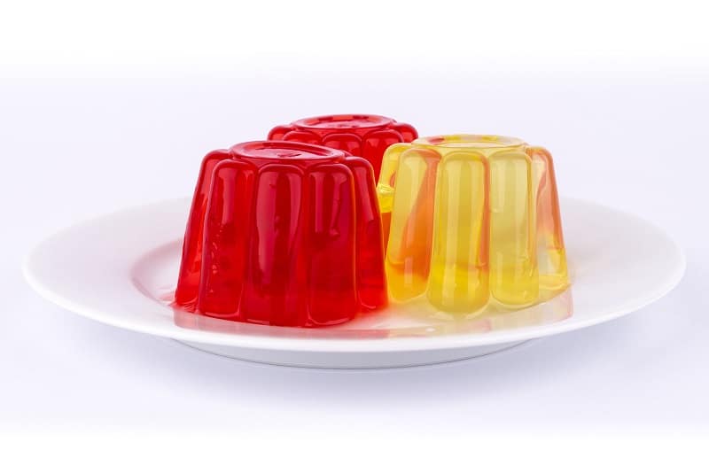 Red and yellow jelly on plate