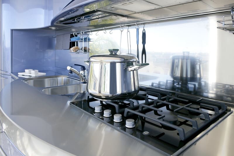 Stainless steel pan on gas hob