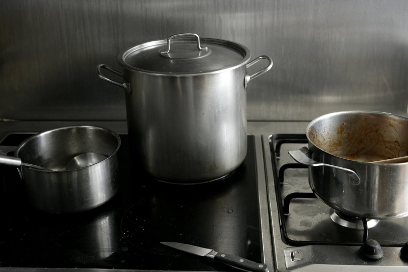Stainless steel pans in kitchen