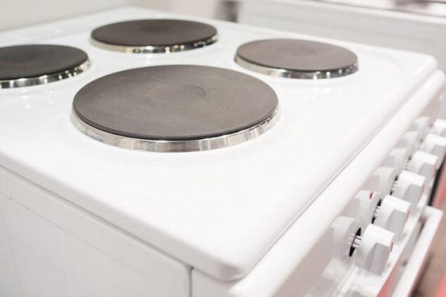 White electric cooker with solid-plate hob