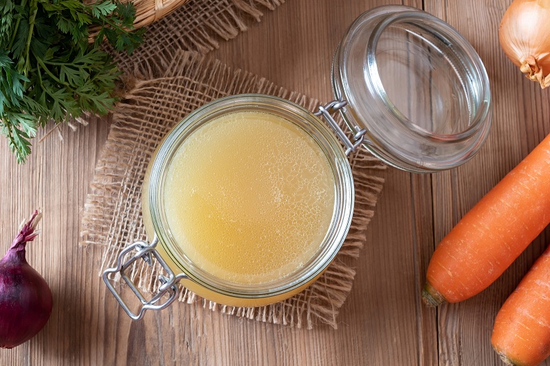 Chicken broth in jar