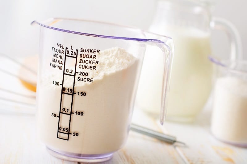 Flour in measuring jug