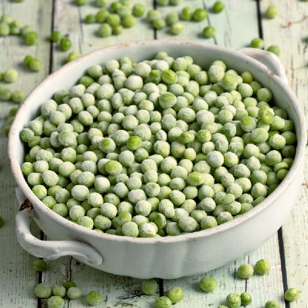 Frozen peas in bowl