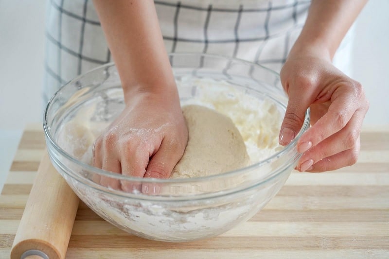 Kneading dough in bowl