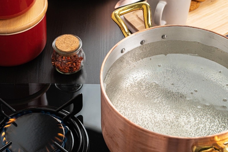Boiling water in pan