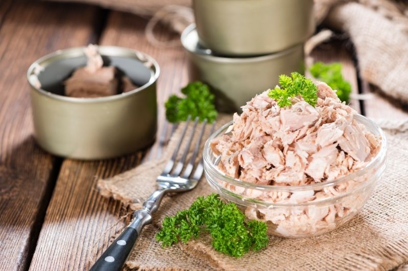 canned tuna in the bowl, cans