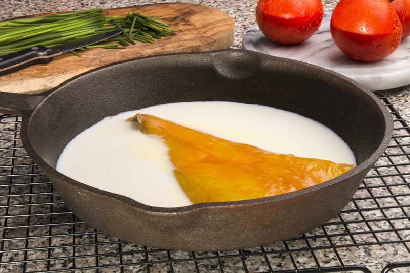 Haddock in pan with milk