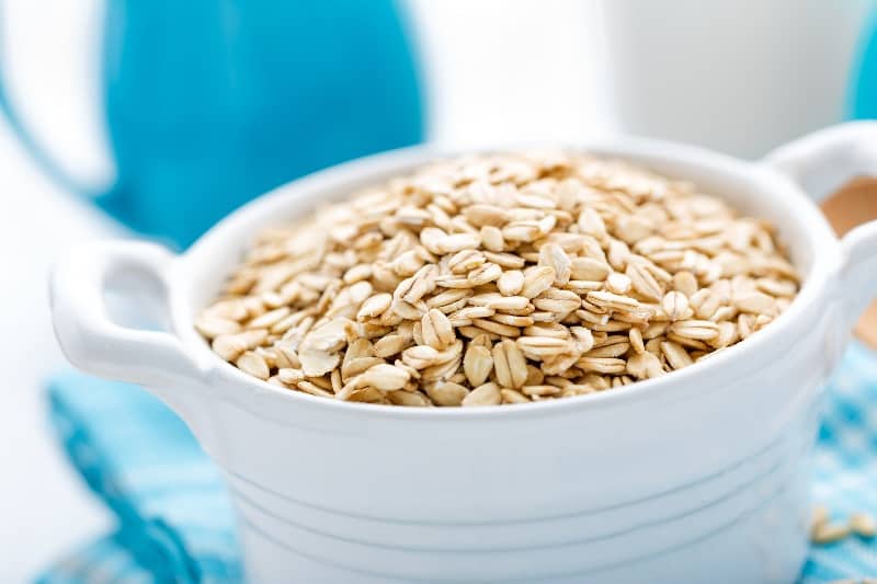 Rolled oats in white bowl