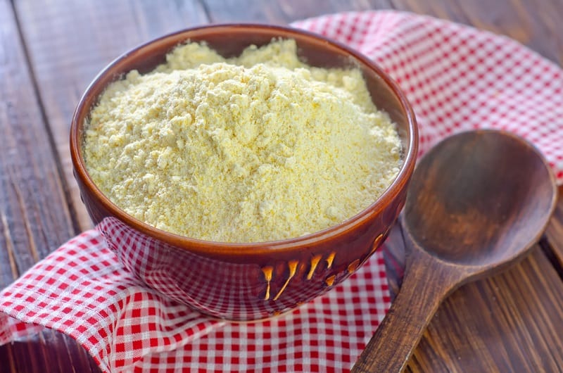 Cornflour in bowl with spoon