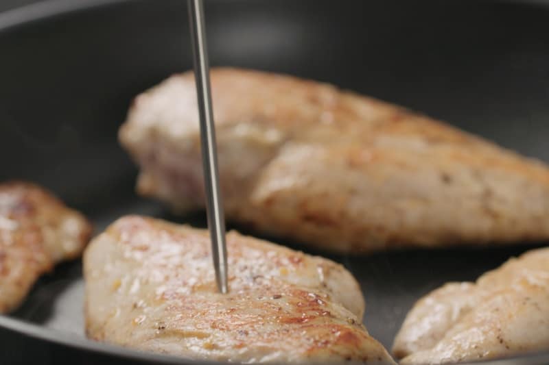Meat thermometer in chicken breast